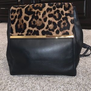Michael Kors Leopard and black leather backpack
